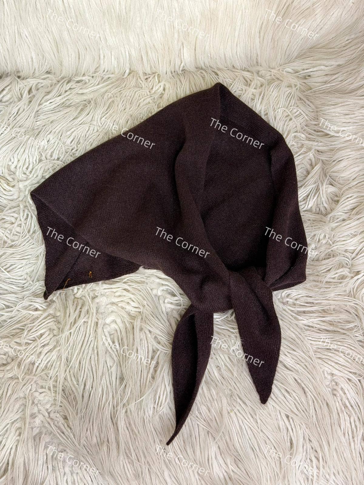 WOLLSCHAL The Corner