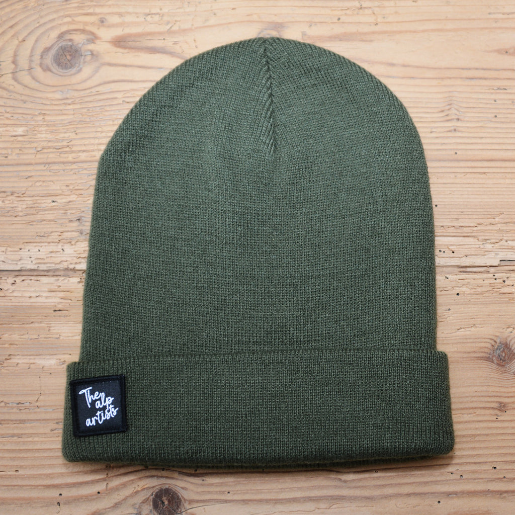 The alp artists Beanies – Textiletikette schwarz